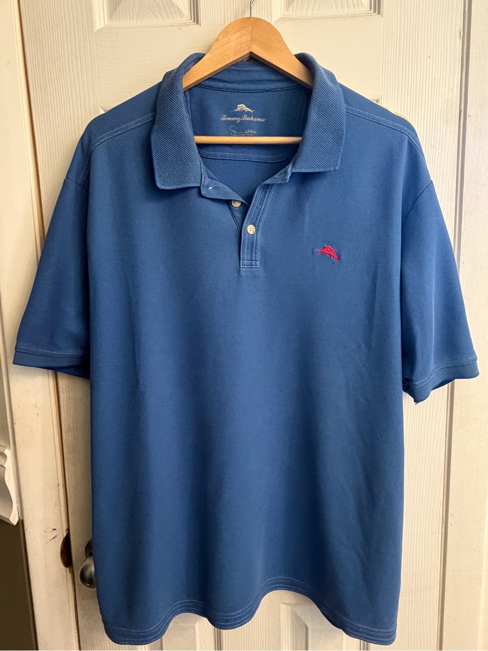Tommy Bahama Blue Polo with Pink Dolphin Emblem